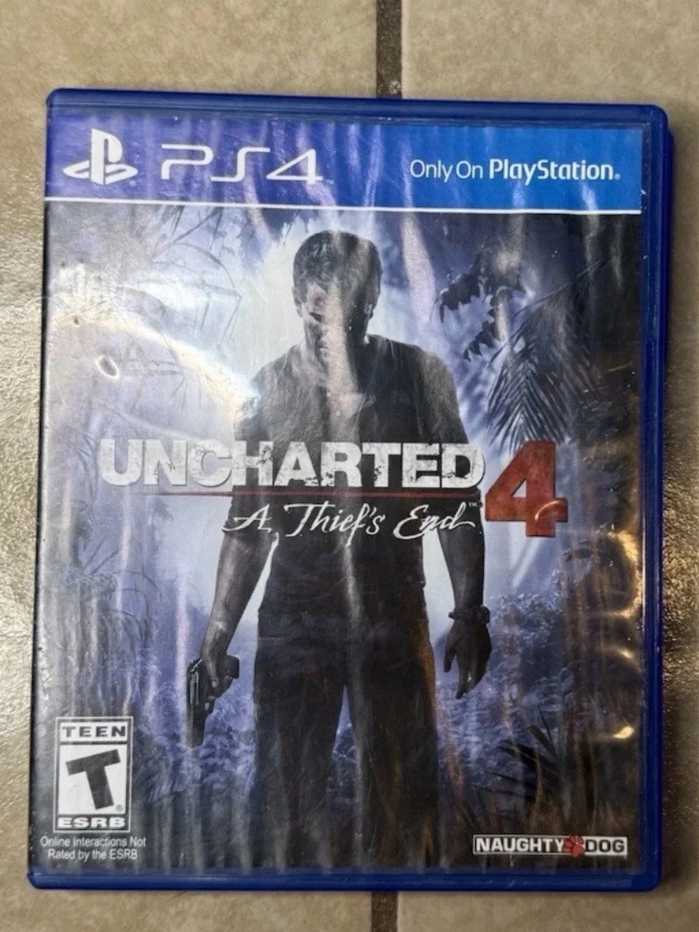 Uncharted 4: A Thief's End PS4 Game Disc - Blue